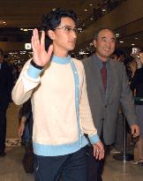 S. Korean World Cup striker Ahn arrives in Japan